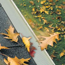 Ultra-durable clog-free rain gutters: Continuous hanger ...