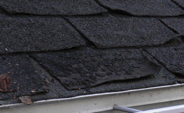 Roof-shingles-broken