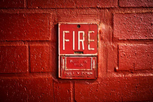 fire-alert-on-the-wall_1122-651